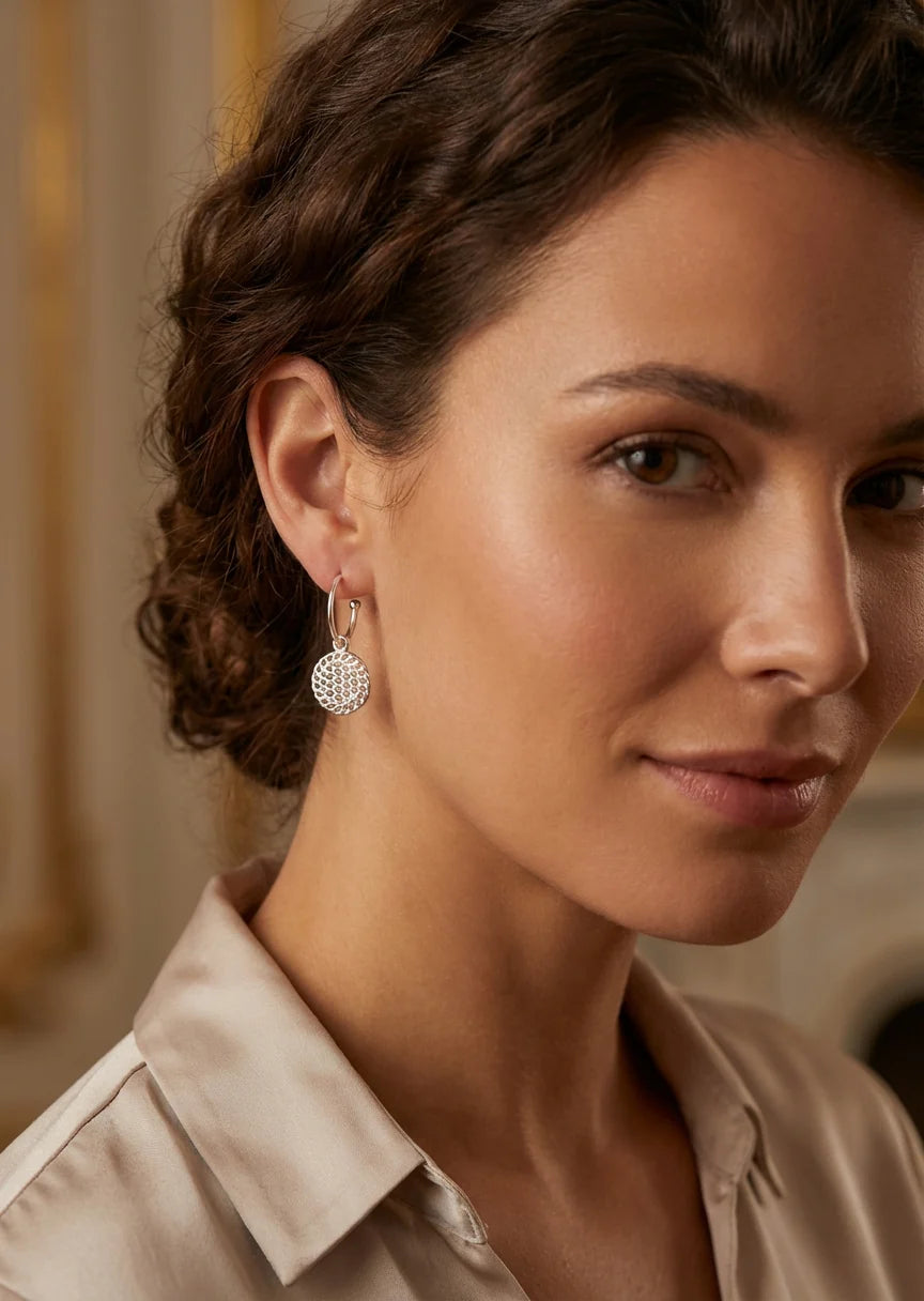 Envy Silver textured circle hoop earring