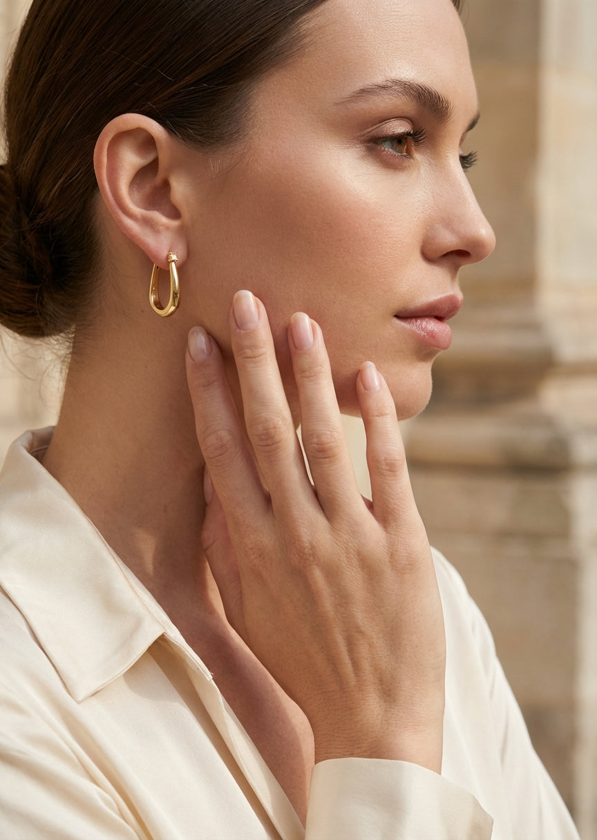 Envy Gold medium drop hoop earrings