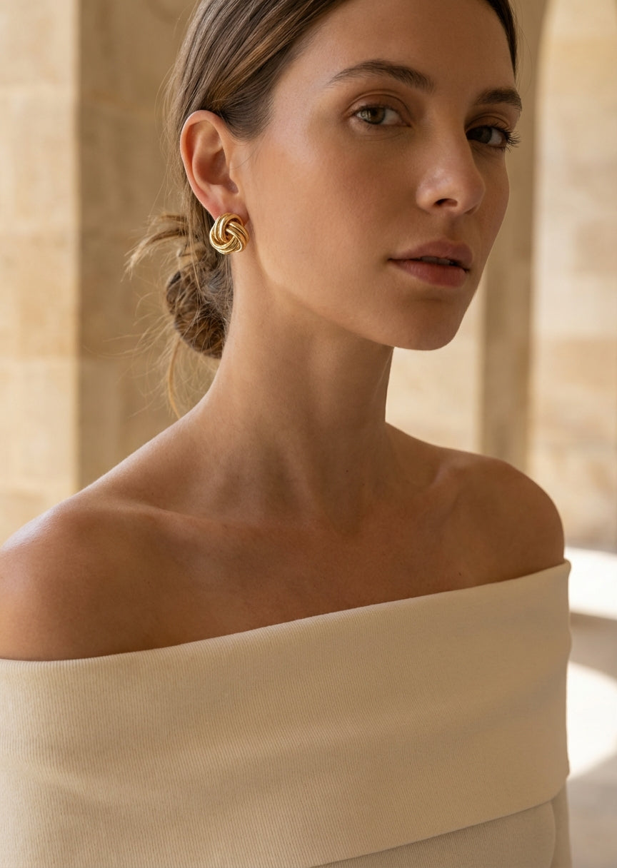 Envy Large Gold twisted knot stud earrings