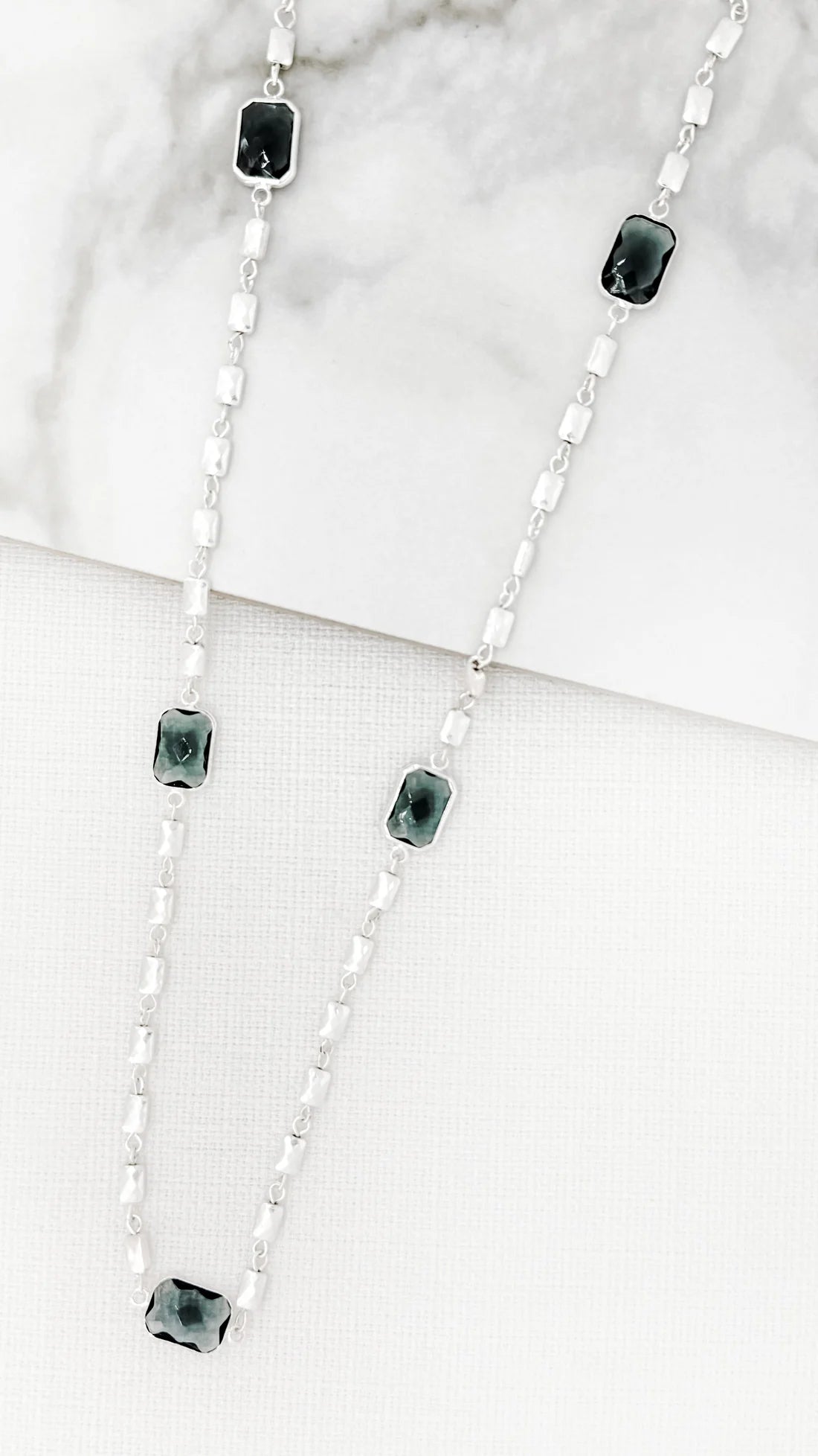 Envy Long silver necklace with faceted grey glass detail