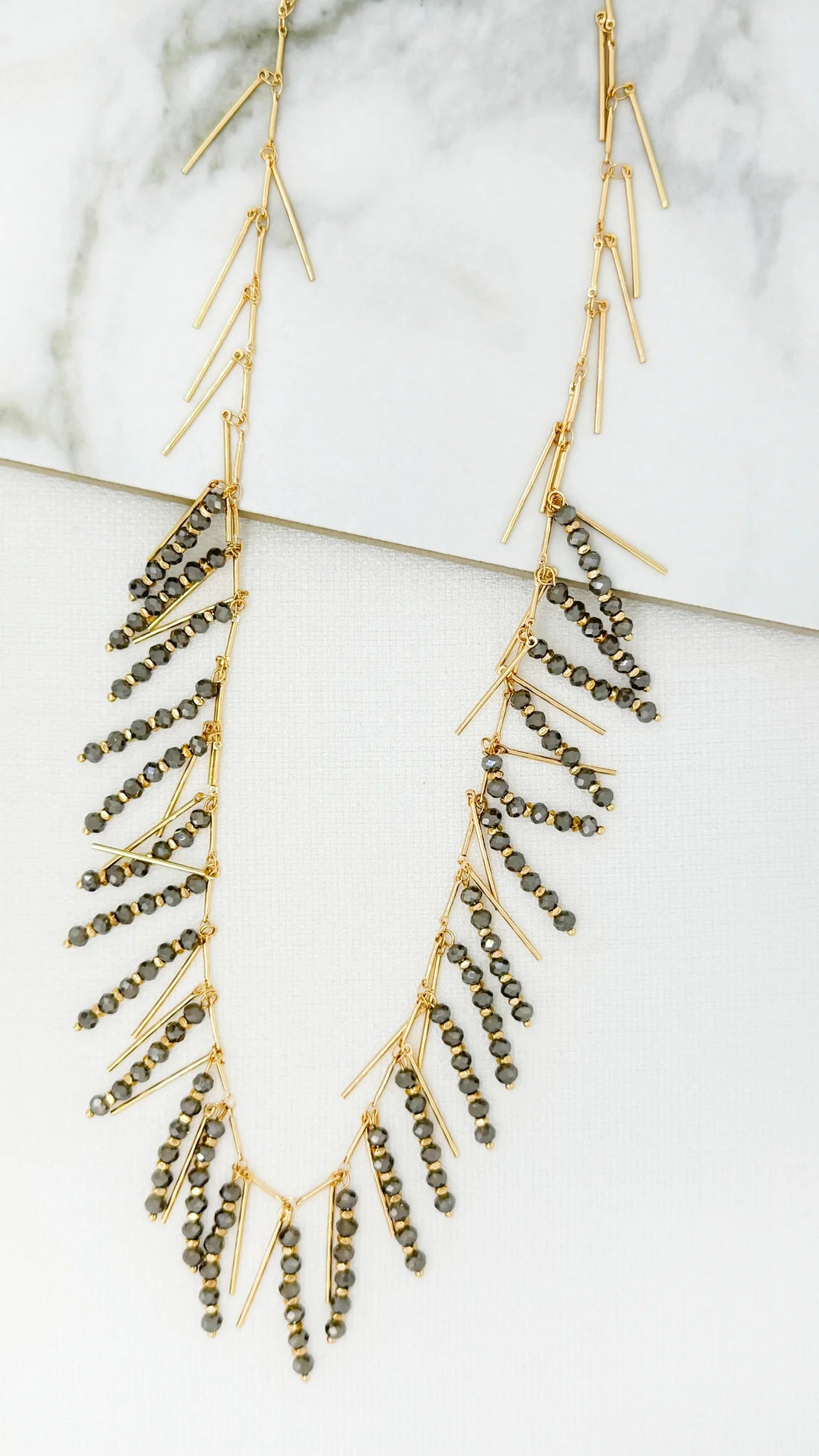 Envy Long gold and grey fringe necklace