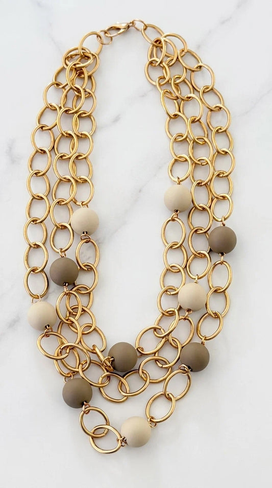 Short Triple Gold Link Necklace with Taupe & Cream Resin Ball Detail