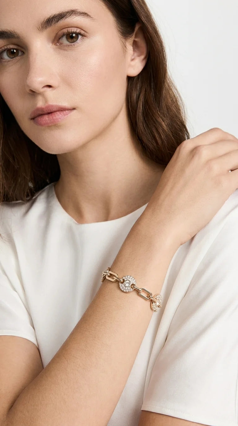 Gold link bracelet with diamante circle detail