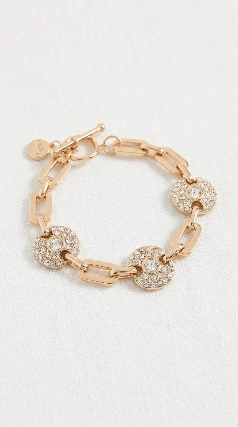 Gold link bracelet with diamante circle detail