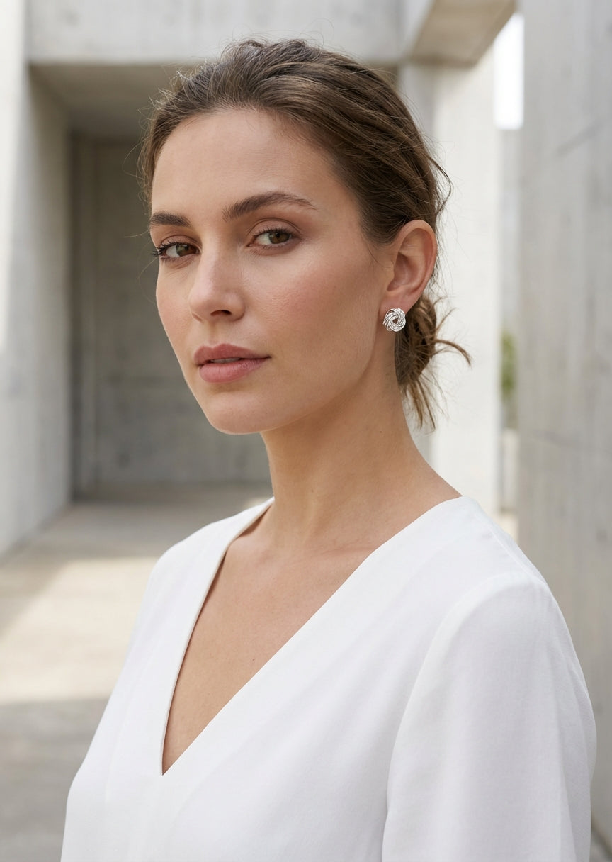 Envy Small silver twisted knot stud earrings