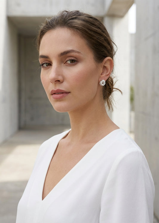 Envy Small silver twisted knot stud earrings