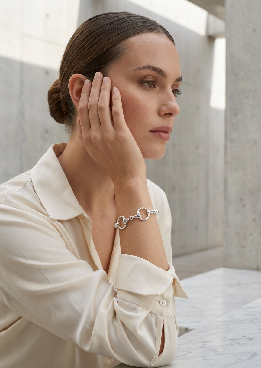 Envy Silver bead bracelet with a gold horse-bit clasp