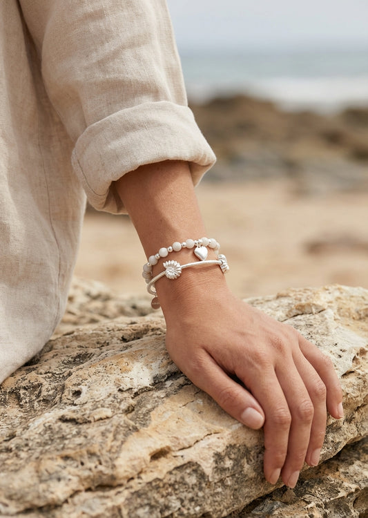 Envy Silver charm‑stack bracelet with silver shells and white pearl beads