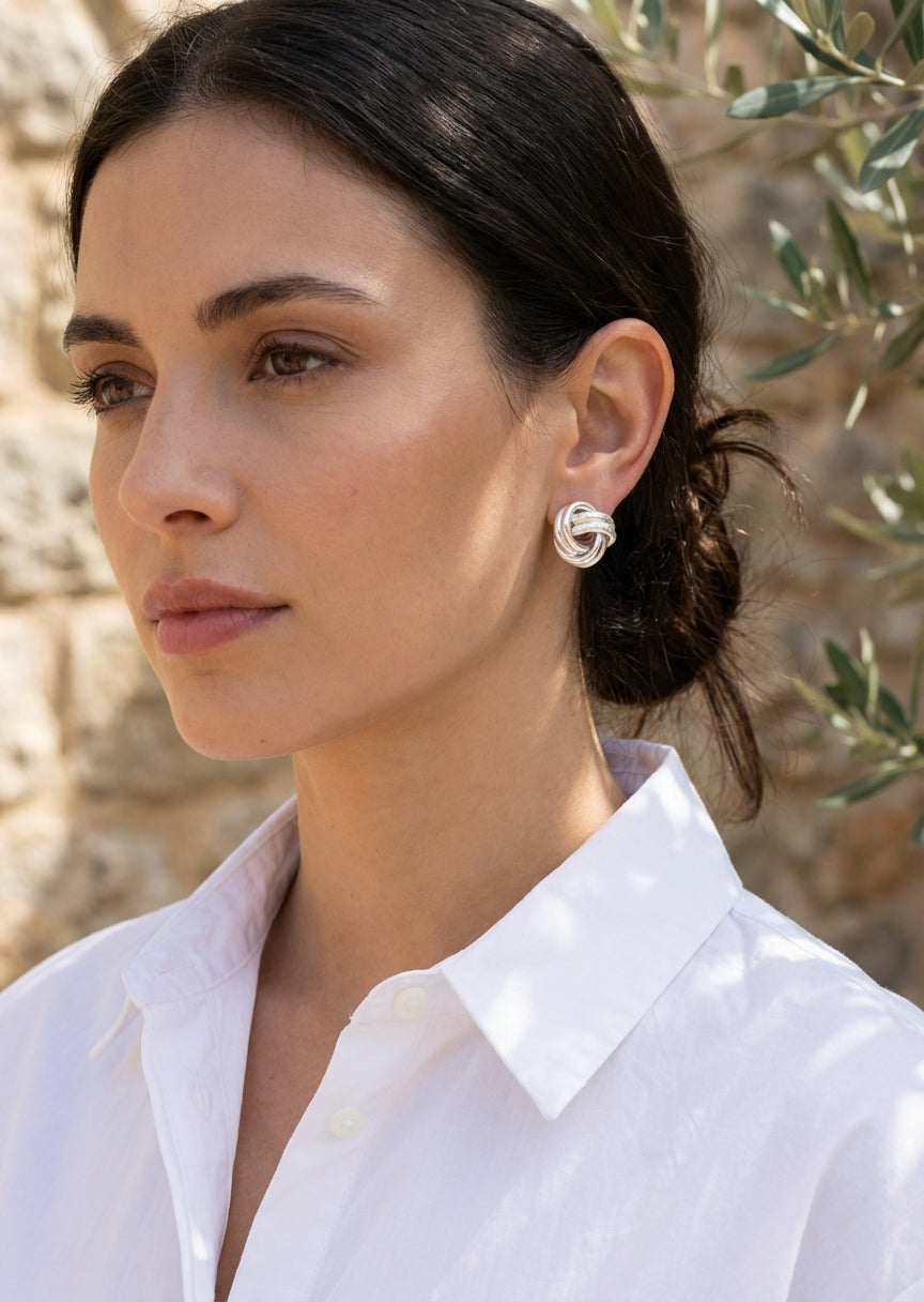 Envy Large silver twisted knot stud earrings